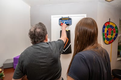 Residents engaging in a fun game activity indoors