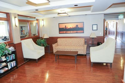 Bright common area with seating and decor