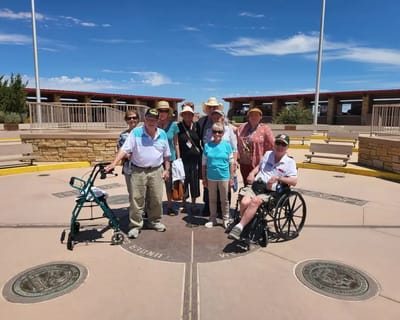 Group of residents enjoying a sunny outdoor space