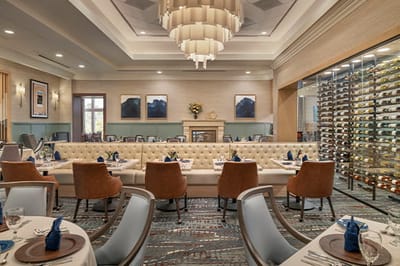 Dining room with elegant decor and wine display