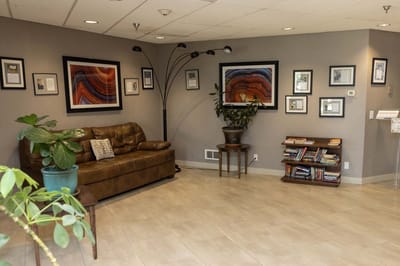 Cozy lobby area with seating and artwork