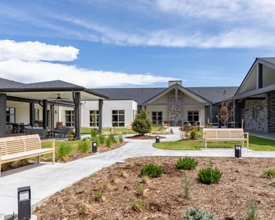 Beautiful outdoor area with benches and landscaping
