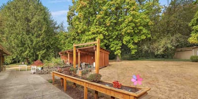 Outdoor space with garden features and seating