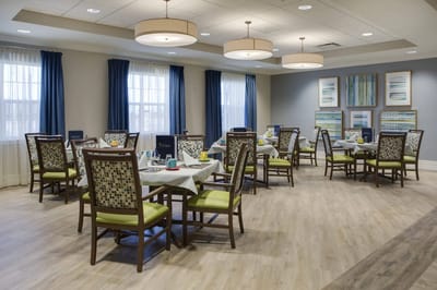 Dining room with tables set for meals