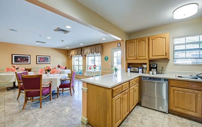 Bright dining area with tables and chairs
