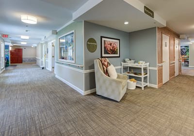 Interior view of a bright common area with seating