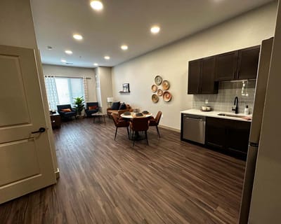 Modern interior of a resident's apartment with seating area