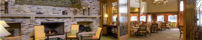 Cozy dining area with fireplace and seating