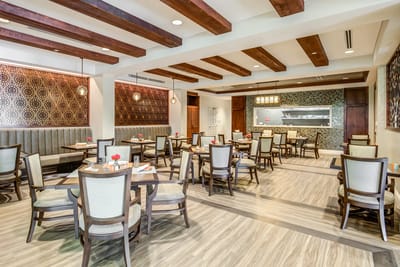 Interior view of a dining room with tables and decor