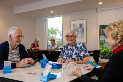 Residents playing games in a common area