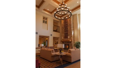 Cozy common area with seating and chandelier