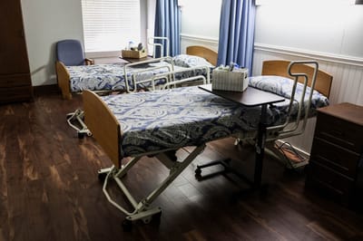 Interior view of a shared resident room with beds