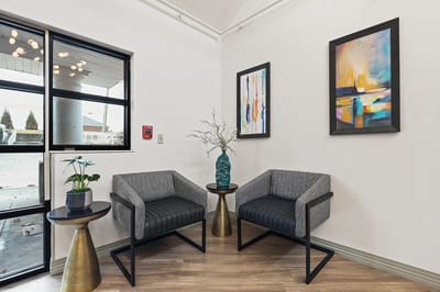 Modern interior seating area with art and plants