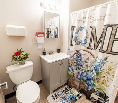 Well-decorated bathroom with floral accents