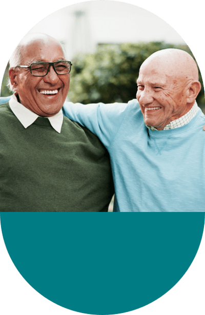 Two smiling residents enjoying each other's company
