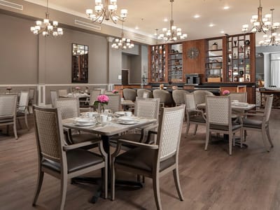 Stylish dining room with elegant decor and tables set