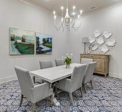 Bright common area with modern furnishings and art