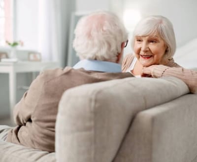 Elderly couple engaging in conversation