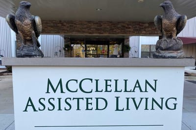 Sign of McClellan Assisted Living with eagle statues