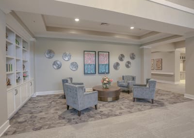 Common area with seating and decorative artwork