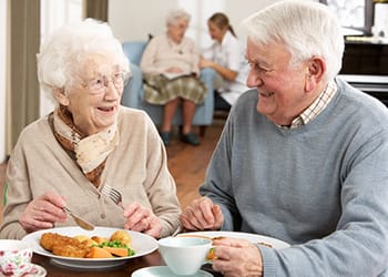 Enterprise Health & Rehabilitation Center, Nursing Home in Enterprise, AL — Seniors enjoying a meal together in a dining area