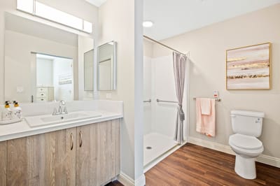 A well-lit bathroom with modern fixtures and decor