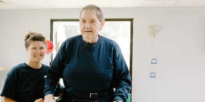 Staff assisting a resident during a therapeutic session