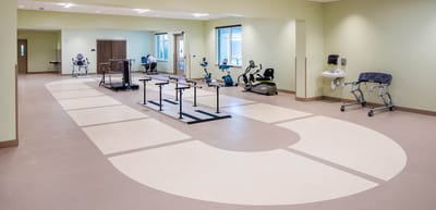Interior view of a fitness room with exercise equipment
