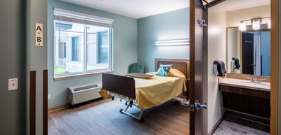 Private resident room with assisted living features