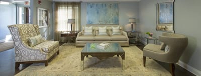 Stylish common area with comfortable seating and artwork