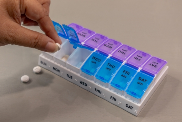 Pill organizer with medications for the week