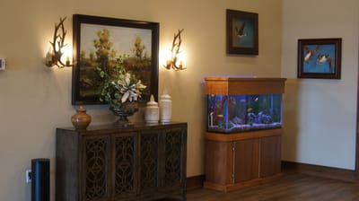 Brownwood Life Care Center, Inc., Nursing Home in Fort Smith, AR — Cozy lobby with an aquarium and decorative artwork