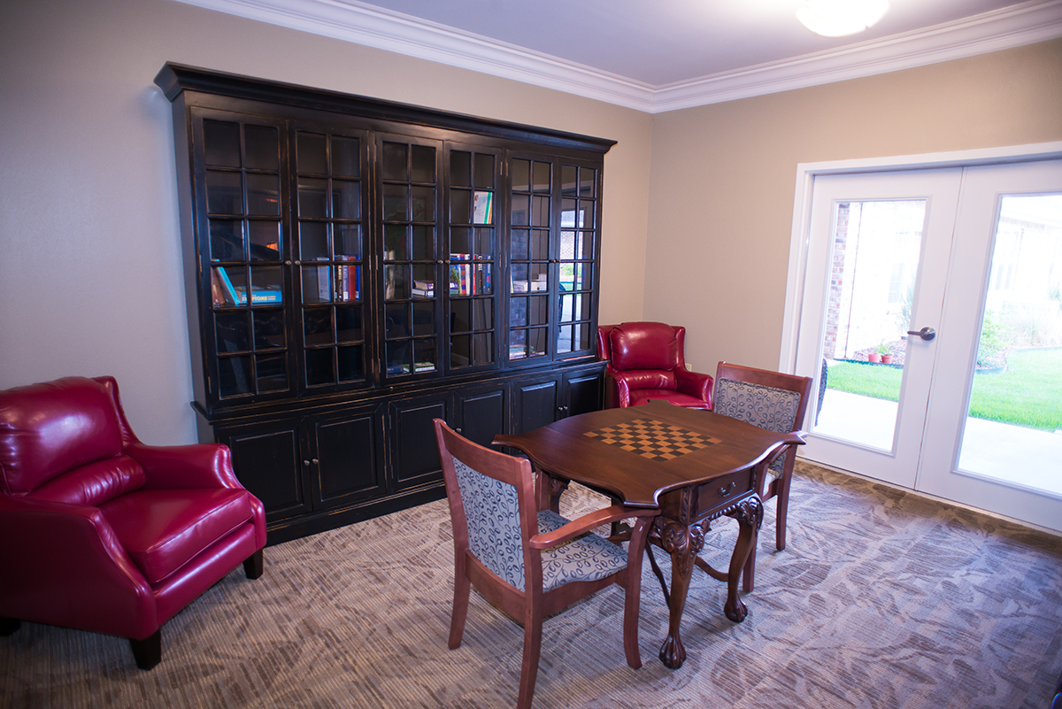 Cozy common area with chairs and a chess table