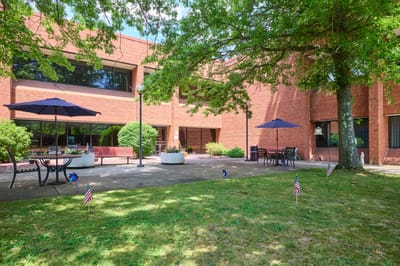 Outdoor patio area with seating and umbrellas