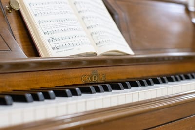 Autumn Ridge Residences, assisted living in Herculaneum, MO — Piano keys with music sheets on a stand