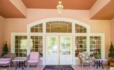 Entrance of Bayview Villa with double doors and seating