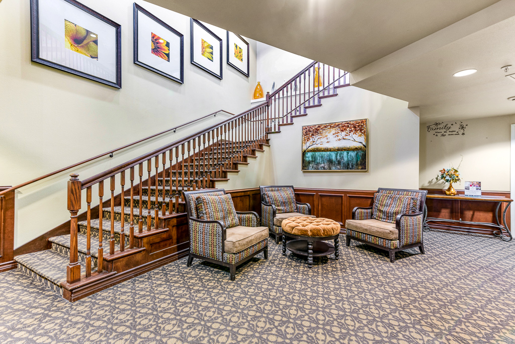 Interior view of a cozy common area with seating