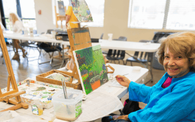 Residents participating in an art activity in a common area