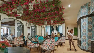 Interior view of a vibrant common area with residents