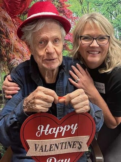 Resident and staff member celebrating Valentine's Day