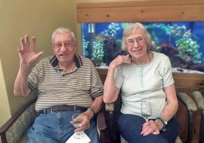 Two residents enjoying time together in a common area