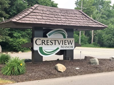 Crestview Manor facility sign at entrance