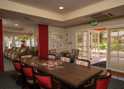 Common area with a large table and seating