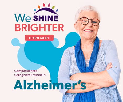 Smiling caregiver promoting Alzheimer's care services