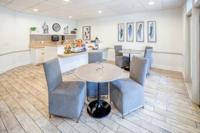Bright dining area with tables and refreshments