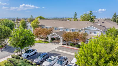 Aerial view of Whittier Place building with landscaped entrance