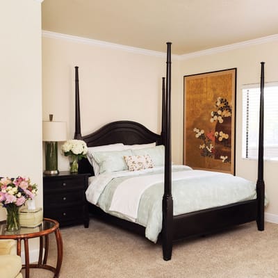 Cozy bedroom with a four-poster bed and decor