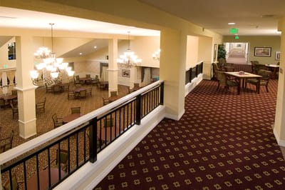 Bright common area with tables and seating