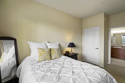 A cozy bedroom in the assisted living facility