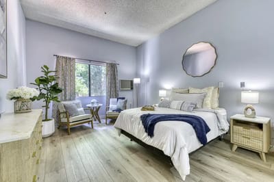 Bright, well-decorated resident room with modern furnishings